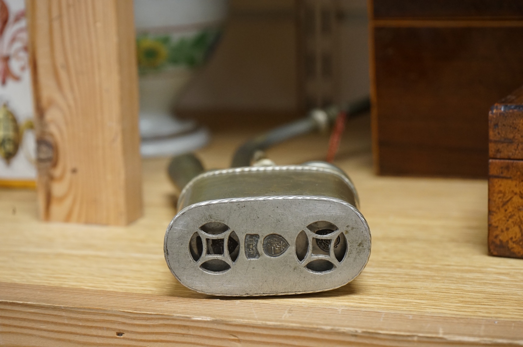 An early 20th century Chinese paktong water pipe, stamped maker’s mark, 26cm high